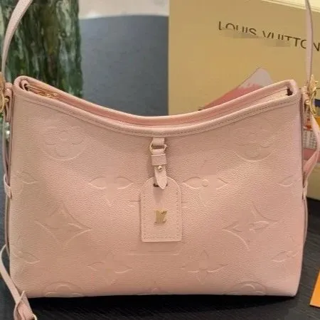 Louis Vuitton Empreinte Leather Hobo Bag