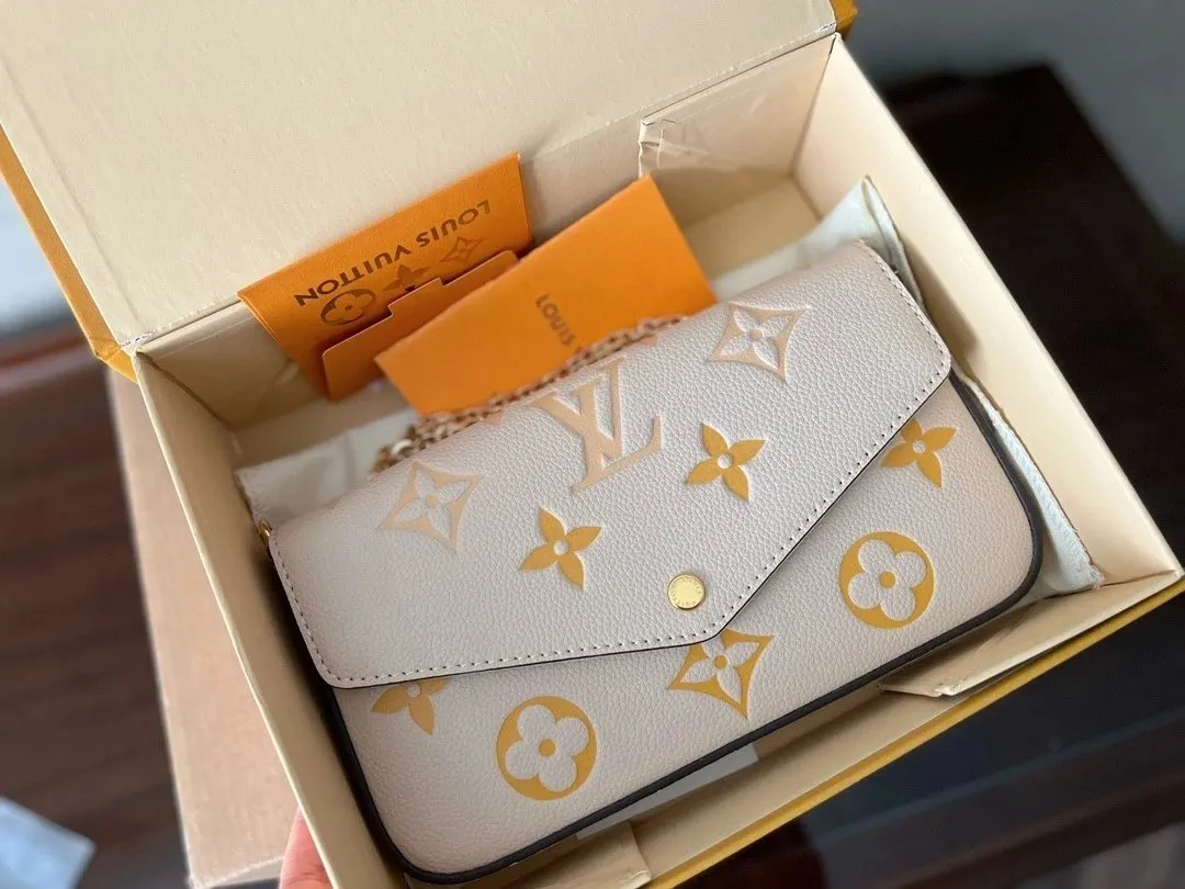 Louis Vuitton Monogram Empreinte Chain Pochette [9 styles]