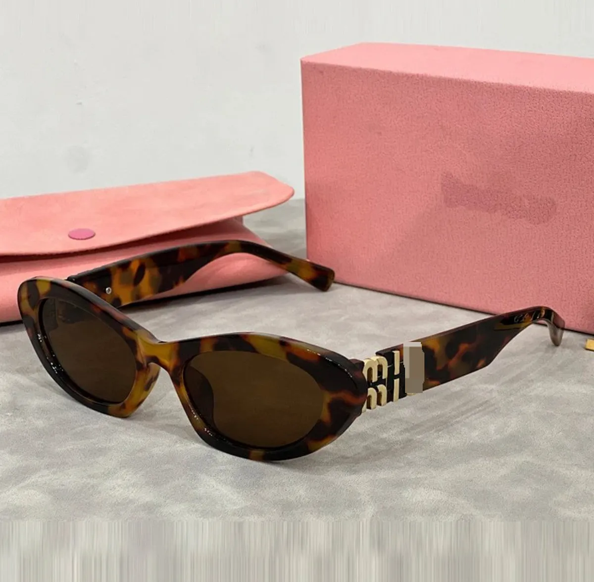 Miu Miu Cat-Eye Sunglasses [7 styles]