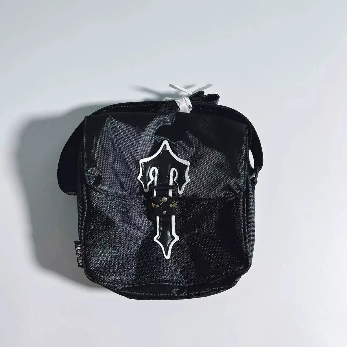 TRIPLESTUD Crossbody Bag